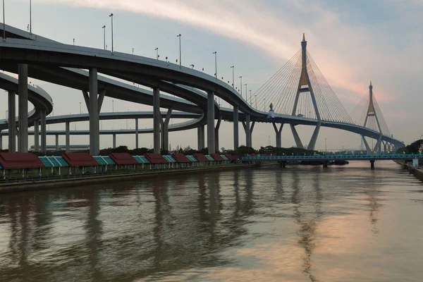 Double suspension bridge crossing Bangkok city river — Stock Photo, Image