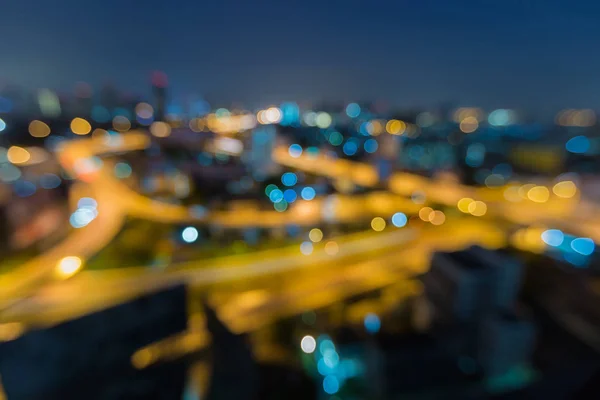 Luftbild verschwommenes Bokeh-Licht über Straßenkreuzung der Stadt — Stockfoto