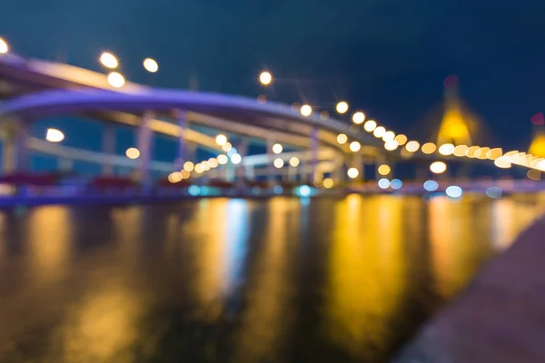 City highway bridge connection blurred bokeh light with water reflection — Stock Photo, Image