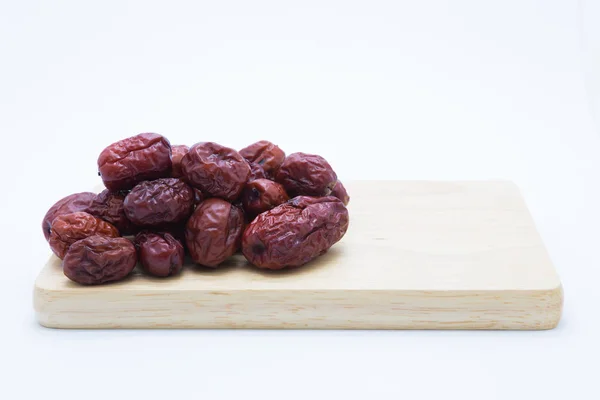 Jujube seco de fruta roja sobre tabla de madera —  Fotos de Stock