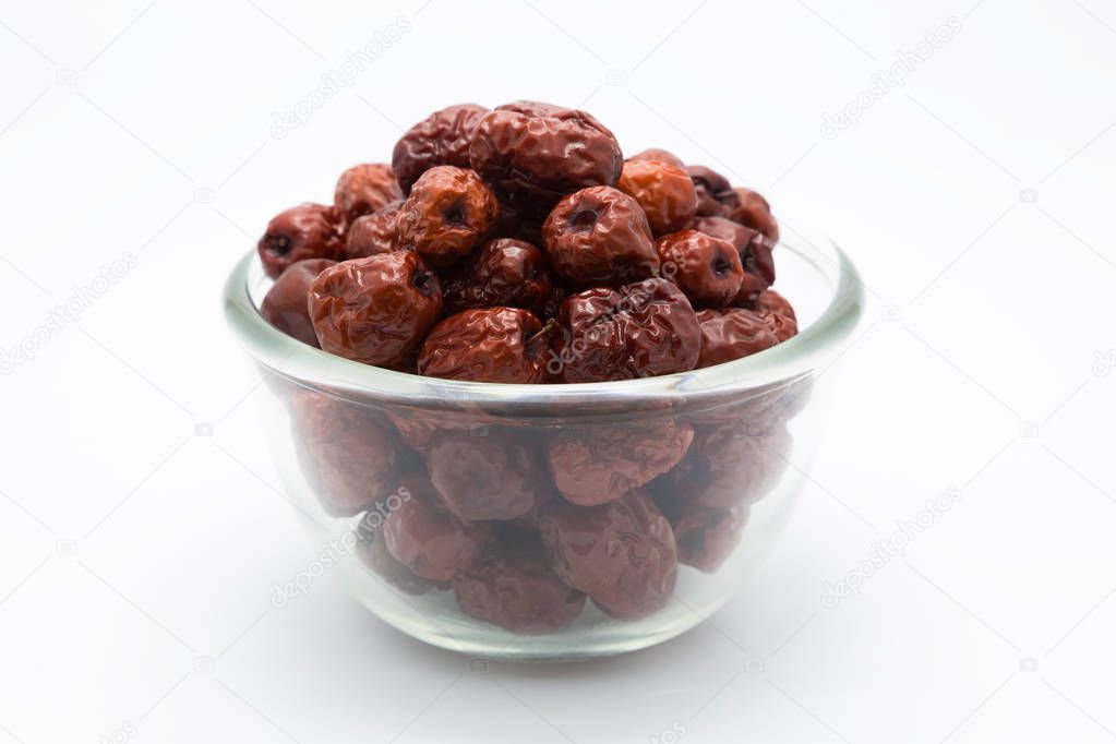 Dried red jujube fruit on white 