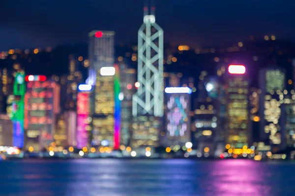 Alacakaranlık bokeh Hong Kong ışık gece görünümü sahil bulanık — Stok fotoğraf