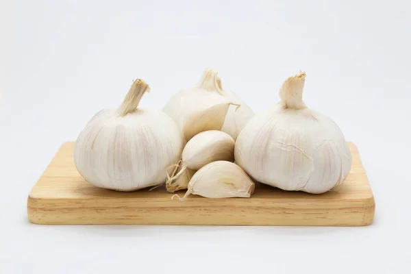 Fresh Garlic on wooden board — Stock Photo, Image