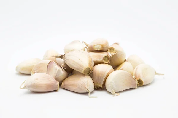 Fresh root garlic on white background — Stock Photo, Image