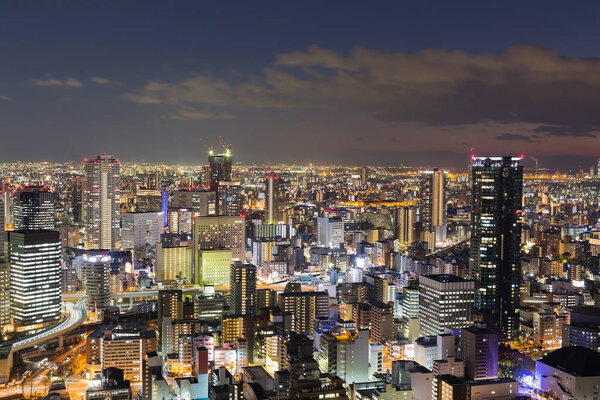 City downtown night lights, Osaka cityscaepe background, Japan