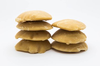 Zor palm şeker beyaz üzerine yığını