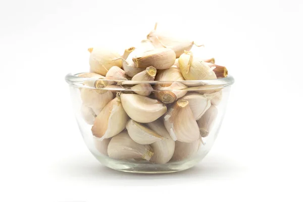 Garlic on glass cup — Stock Photo, Image