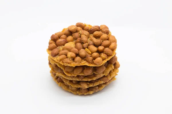 Brown fried peanut cracker on white — Stock Photo, Image