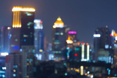 Bokeh ışık şehir şehir merkezinde ofis binası gece bulanık