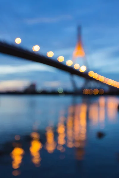 Blue twilight night view suspension bridge river front — Stock Photo, Image