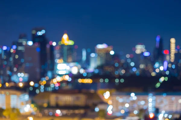 Crepúsculo noche borrosa bokeh paisaje urbano centro de la ciudad — Foto de Stock