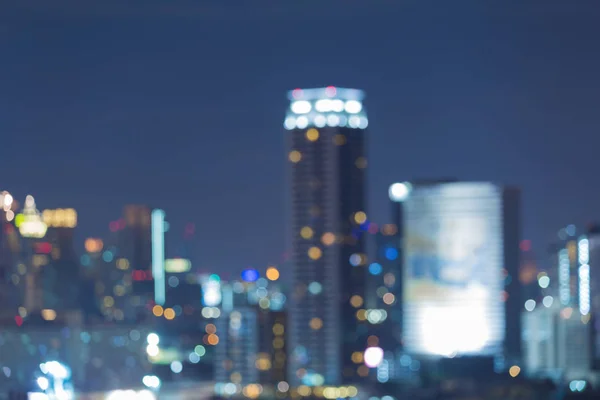 Night blurred bokeh light office building — Stock Photo, Image