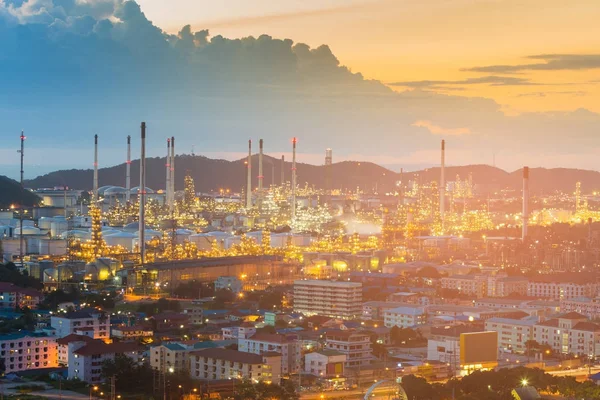 Refinery with mountain backgorund at night, industrial background