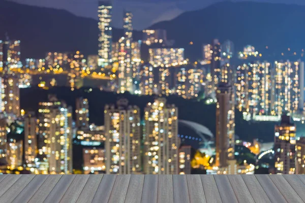 Blurred bokeh light city building downtown Hong Kong, abstract background