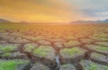 Zemin, çatlak güzelliği doğal manzara arka plan üzerinde günbatımı manzarası