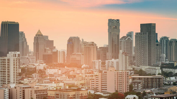 Office building city downtown with after sunset sky, cityscape background