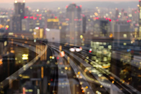 运动轨道在城市上空的移动模糊散景光 抽象背景 — 图库照片