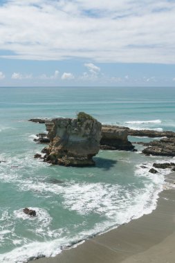 Kum plaj, Panakaiki South Island Yeni Zelanda doğal peyzaj kayada gözleme