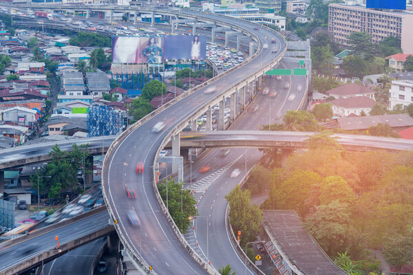 Interchange intersection with motion blur moving in city downtown