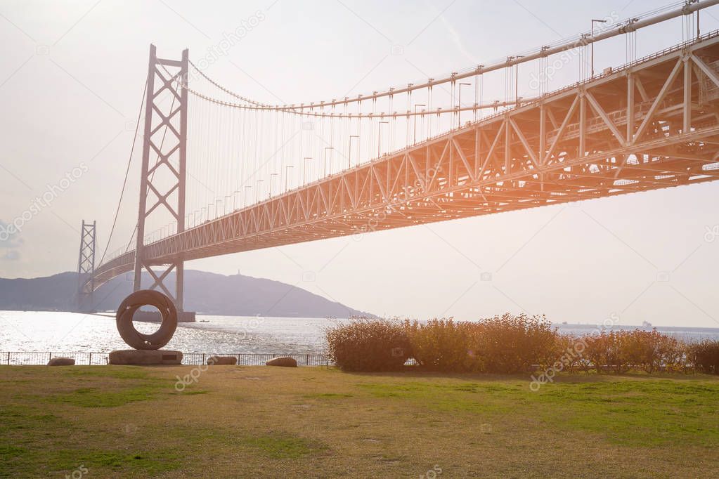 Akashi Suspension bridge over sea coast skyline Kobe Japan