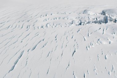 Snow white ground over fox glacier, natural winter season background clipart