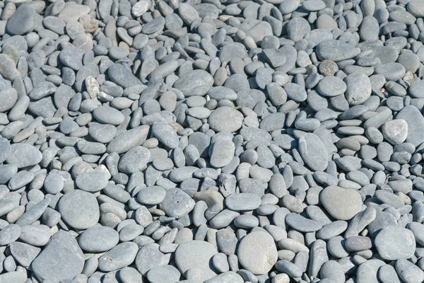 Natural sea stone on the sea shore, texture and background