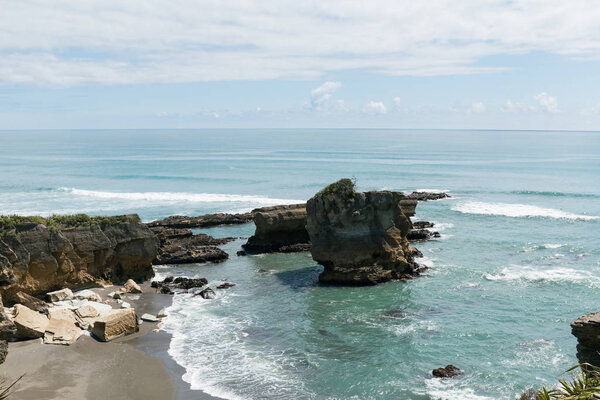 Punakaiki beach skyline in Tasman sea, New Zealand natural landscape background
