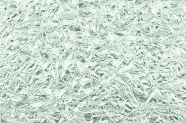 Buruşmuş alüminyum tabakası. Soyut desenli arkaplan