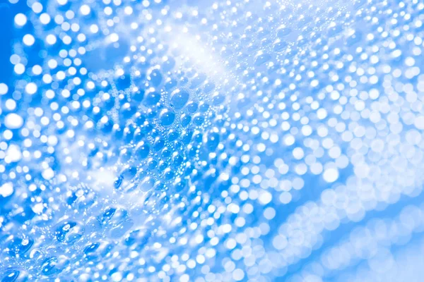 Gotas Agua Sobre Fondo Textura Bokeh Vidrio Azul Con Luces — Foto de Stock
