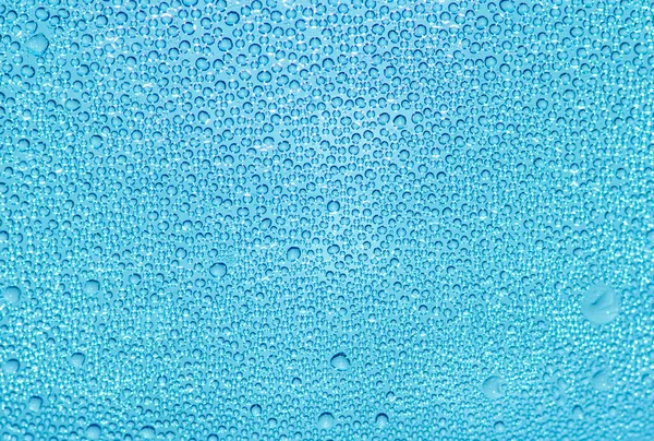 Wassertropfen Auf Blauem Glas — Stockfoto