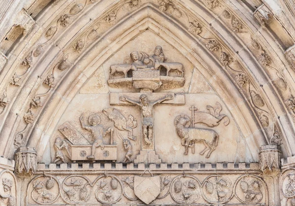 Christian relief (of the 14th century) on the facade of a church — Stock Photo, Image