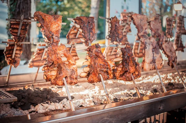 Traditional Argentinian asado roasted lamb grilled meat. — Stock Photo, Image