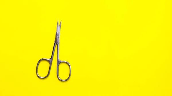 Manicure tool on a yellow background. — Stock Photo, Image