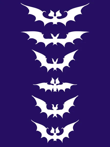 Sílhuetas brancas de morcegos — Vetor de Stock