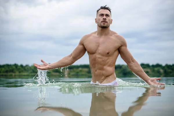 Sexy Sporty Man Macho White Shorts Bodybuilder Emerges Water Cloudy — Stock Photo, Image