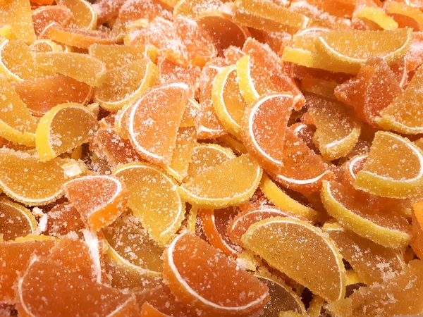 texture of marmalade slices in sugar in the form of slices of oranges