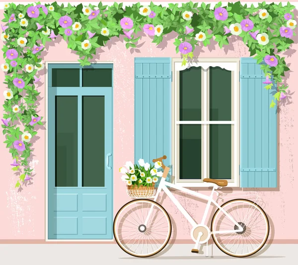 Bicicleta com flores perto de casa de estilo provence. Fachada de edifício vintage. Conjunto de vetores: porta, janela, bicicleta, flores . —  Vetores de Stock