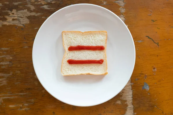 bread of breakfast is written Equal sign by ketchup on write plate. A to Z and Number and Special characters set.