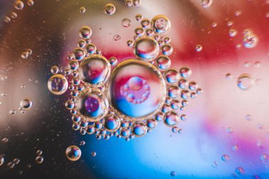 Evren ya da gezegenler kozmik soyut bir psikedelik arka plandır. Soyut atom molekül yapısı. Kabarcık. Havadan ya da moleküllerden makro çekim. Biyoloji, fizik veya kimya soyut