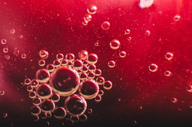 Evren ya da gezegenler kozmik soyut bir psikedelik arka plandır. Soyut atom molekül yapısı. Kabarcık. Havadan ya da moleküllerden makro çekim. Biyoloji, fizik veya kimya soyut