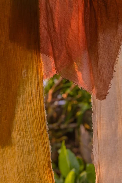 authentic house, villa in rural Balinese, with natural decor, in the form of drying fabrics on the terrace