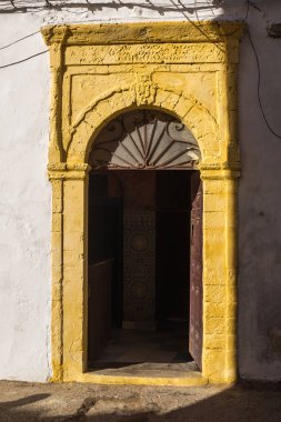 Yellow gate with an arch, Morocco