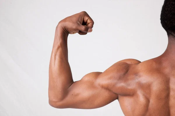 Man Flexing Muscular Arm — Stock fotografie