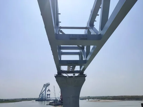 stock image Munshiganj, Bangladesh- March 09, 2020: Construction work of Padma multipurpose bridge is going on in full swing in bank of Padma river, Munshiganj, Bangladesh on March 09 2020