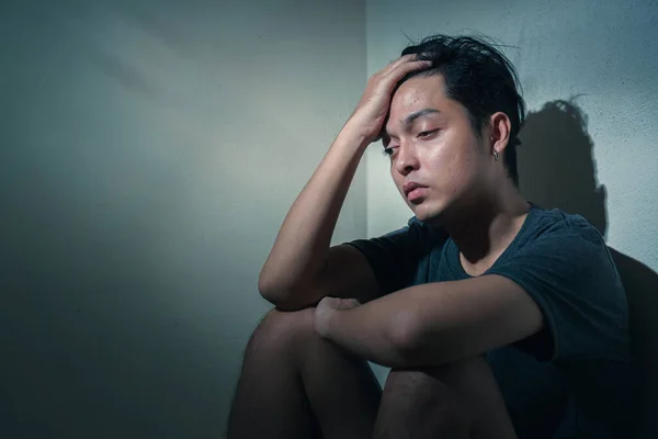 Young Depressed Asian Man Sitting Alone Dark Room Low Light — Stock Photo, Image
