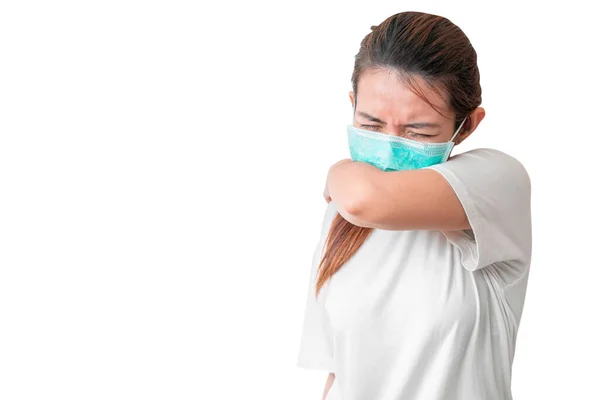 アジアの女性は彼女の肘で咳をし 感染症を保護するための医療保護面マスクを着用します — ストック写真