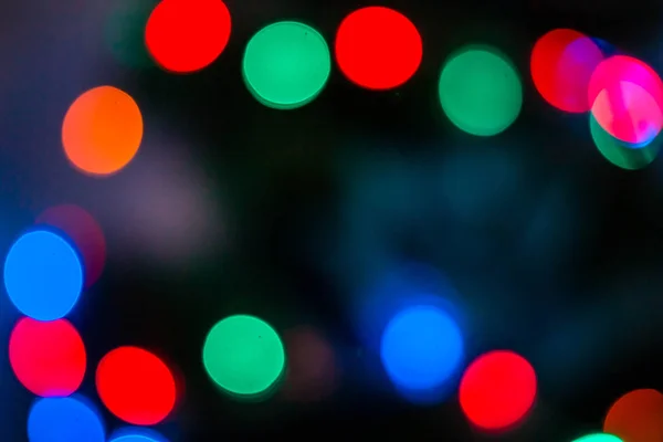 Bokeh Auf Dunklem Hintergrund Verschwommene Weihnachts Und Neujahrsleuchten Hintergrund Farbe — Stockfoto