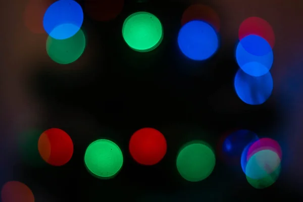 Bokeh Auf Dunklem Hintergrund Verschwommene Weihnachts Und Neujahrsleuchten Hintergrund Farbe — Stockfoto