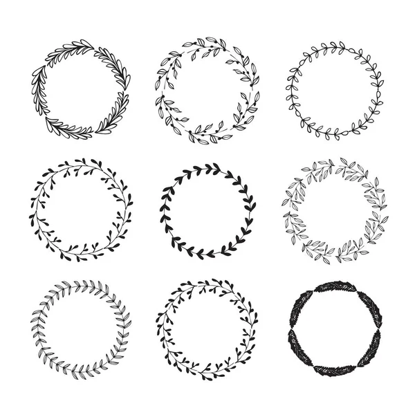 Hand drawn set of floral wreaths — Stock Vector