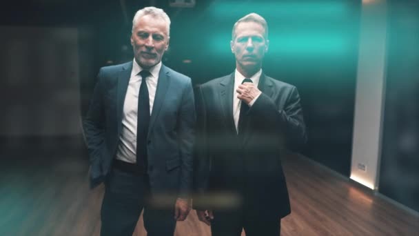 Two Businessmen Suits Posing Camera Holographic Background Slow Motion — Stock Video